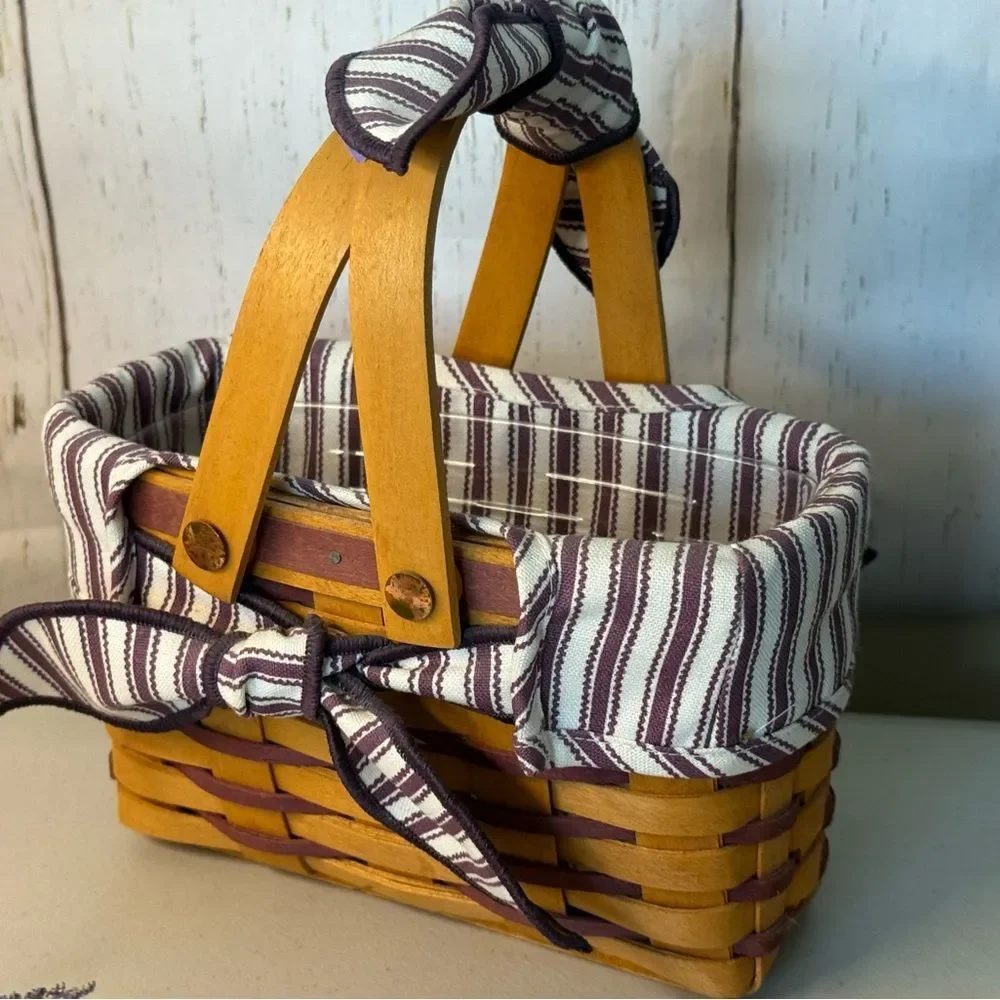 1998 Longaberger Basket with Plaid Liner Charm Ties Sweetheart Basket contents
